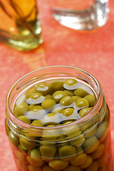 Image showing Preserved green peas in jar