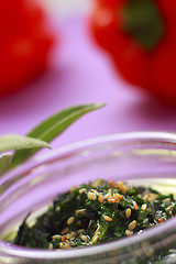 Image showing Herbal green dressing with sesame seeds