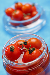 Image showing Cocktail tomatoes in jar