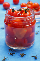 Image showing Cocktail tomatoes in jar