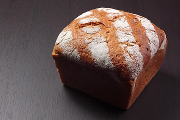 Image showing Wholemeal bread on dark board