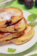 Image showing Blinis (from white flour, with plum) on plate