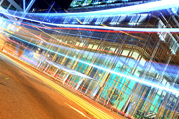 Image showing Fast moving bus at night