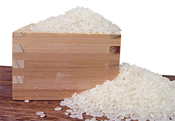 Image showing Rice and wooden container