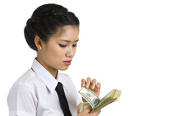 Image showing businesswoman counting money