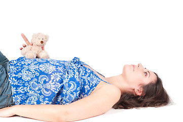 Image showing Portrait of pretty pregnant woman with toy