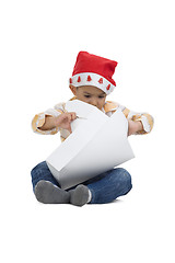 Image showing boy opening christmas gift