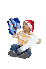 Image showing boy opening christmas gift