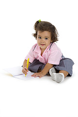 Image showing cute girl writing