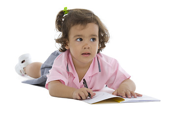 Image showing cute girl writing