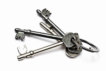 Image showing A bunch of old keys isolated on white 