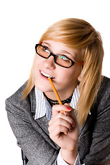 Image showing young businesswoman with pencil 