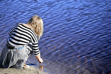 Image showing Girl by water