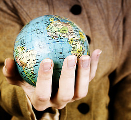 Image showing Globe in a girl's hands