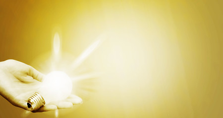 Image showing Background with lit lightbulb