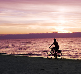 Image showing Bicyclist on the beach