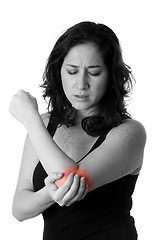 Image showing Woman with elbow pain
