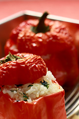 Image showing Red peppers with rice stuffing