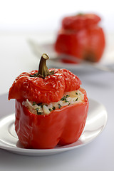 Image showing Red peppers with rice stuffing