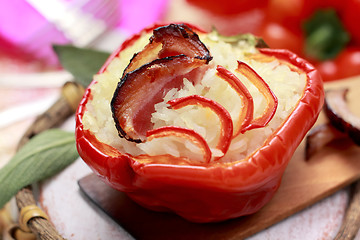 Image showing Red pepper with bacon and rice stuffing