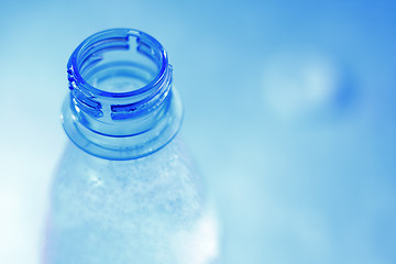 Image showing Open bottle in blue