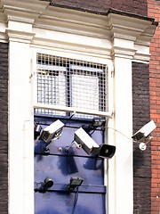 Image showing security system on door of building