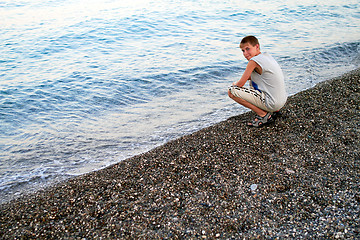 Image showing Smiling boy at the beach