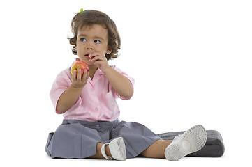Image showing cute little girl with an apple