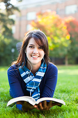 Image showing Mixed race ollege student studying