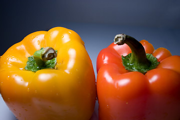 Image showing Isolated Orange and Yellow Peppers