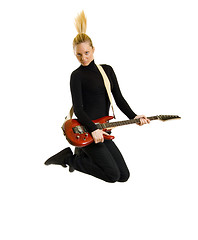 Image showing woman guitarist jumps