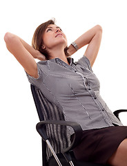Image showing  woman leaning back on a chair
