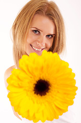 Image showing woman is handing you a flower