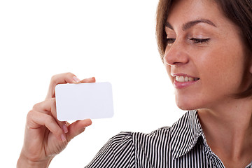 Image showing woman looking at a business card