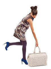 Image showing  picking up a big purse