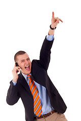 Image showing business man winning at phone