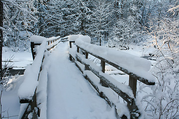 Image showing Snovy wooden bridge