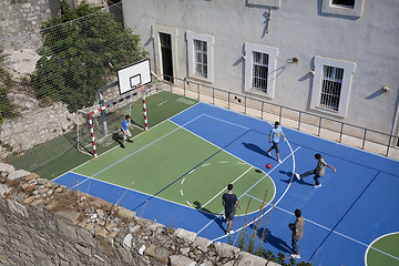 Image showing Teens palying soccer