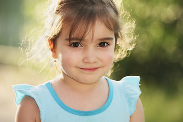 Image showing Little girl in blue dress