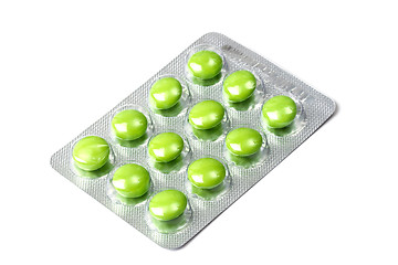 Image showing Package of green pills isolated on white 