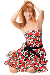 Image showing Smiling red-haired girl in a dress