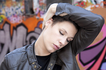 Image showing  woman massaging head