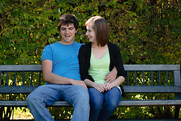 Image showing Two Teenagers On A Bench