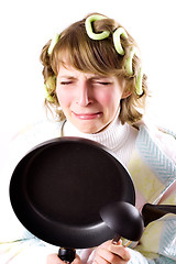 Image showing crying housewife with pan