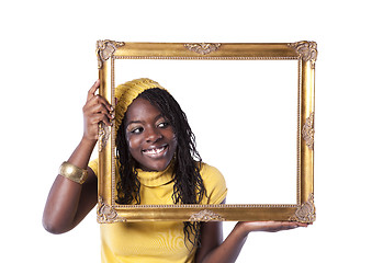 Image showing young woman inside a picture frame