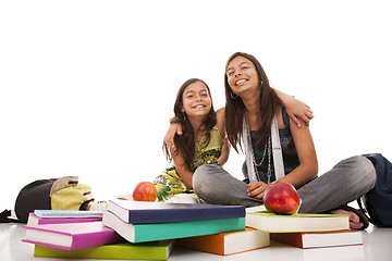 Image showing two young student sisters