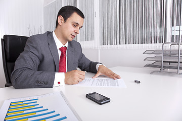 Image showing Mature businessman working at the office