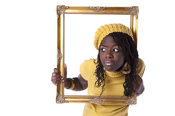 Image showing young woman inside a picture frame