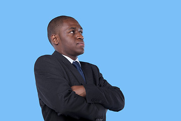 Image showing African businessman with arms crossed