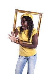 Image showing young woman inside a picture frame